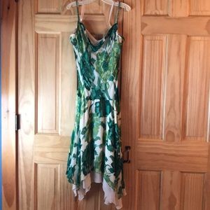 Elegant dress with beaded straps and decor.